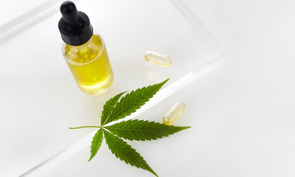 cbd oil with leaf on lucite