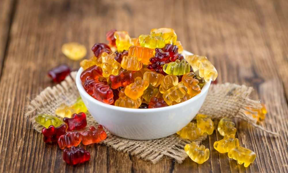 an overflowing bowl of gummy bears