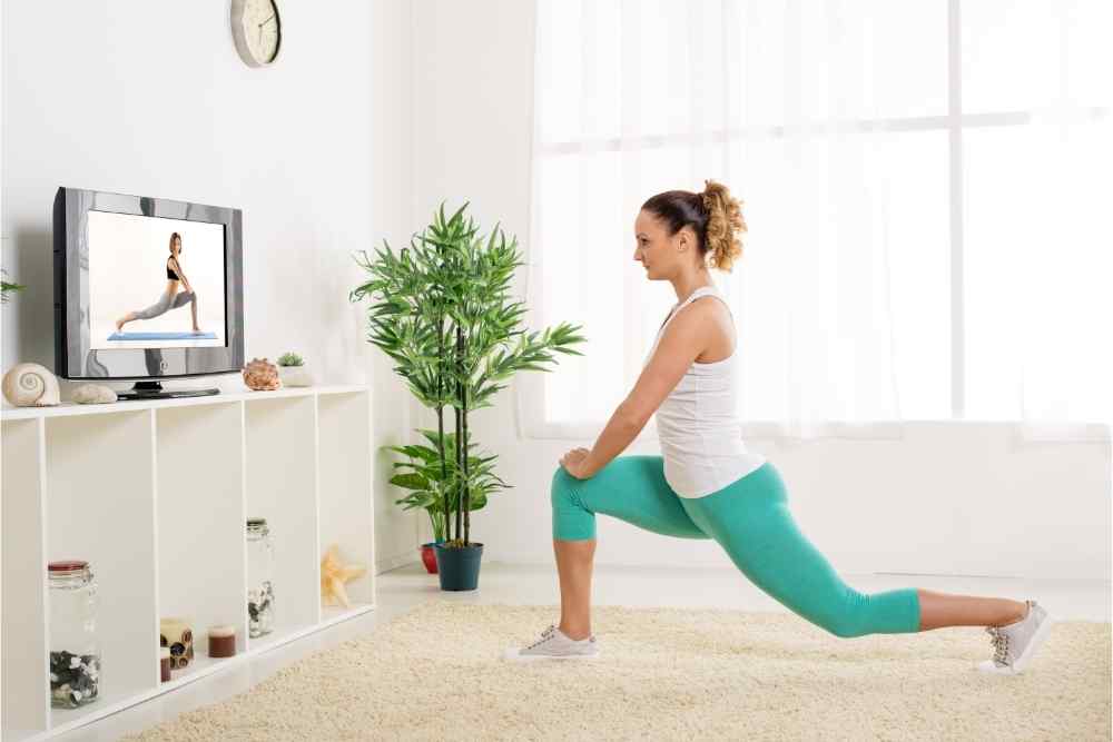 woman doing yoga workout at home